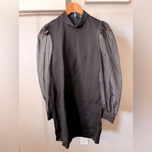 Black cocktail dress with mesh sleeves